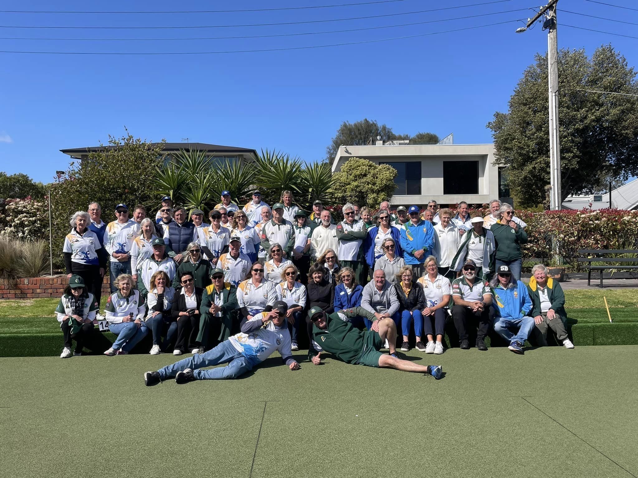 Members gathered on the bowling green on a club day