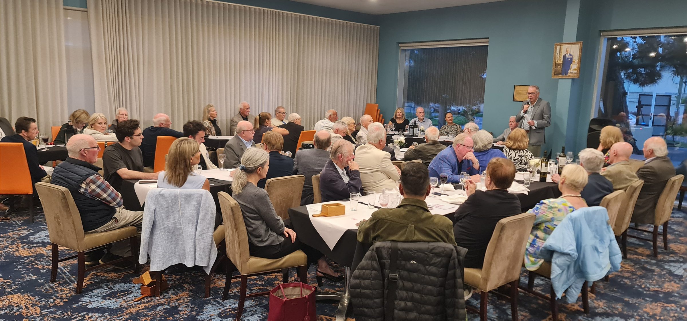A full room at a club function dinner